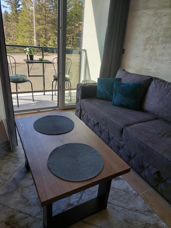Uma área de estar em Apartlux Helena1