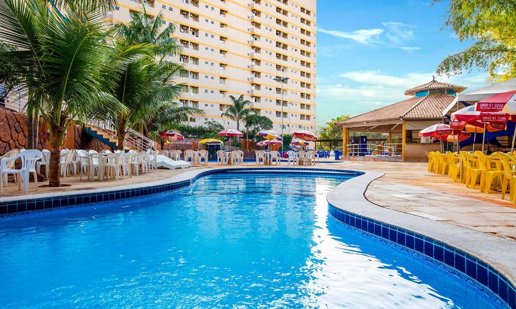 A piscina localizada em GOLDEN DOLPHIN Resort - Grand & Express - Caldas Novas - COM TV A CABO - Aguas Termais ou nos arredores