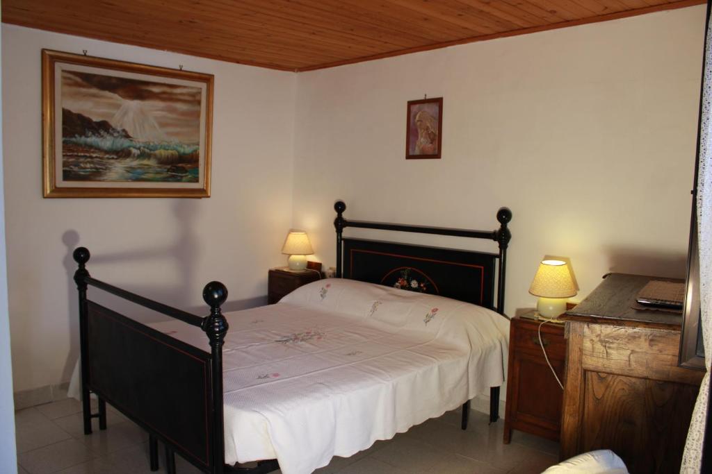 Postel nebo postele na pokoji v ubytování Casa di Giulietta