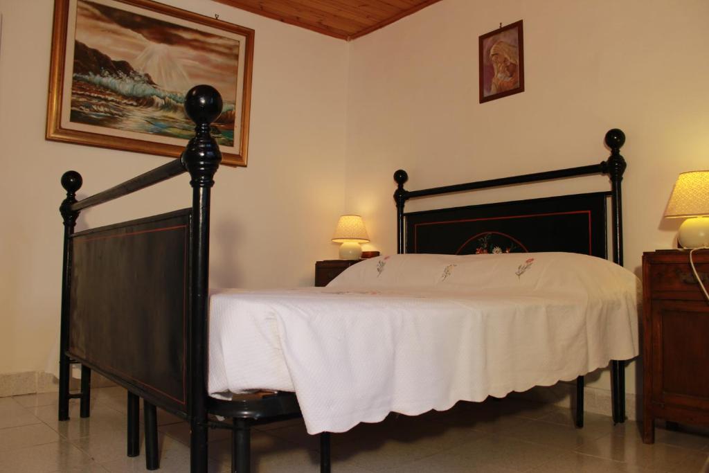Postel nebo postele na pokoji v ubytování Casa di Giulietta