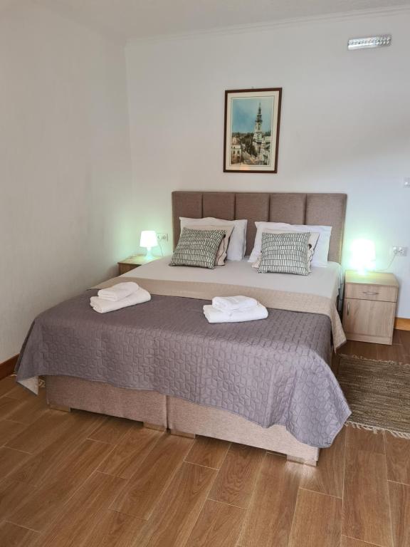 Postel nebo postele na pokoji v ubytování Apartments Zec