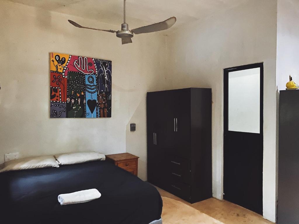 Postel nebo postele na pokoji v ubytování la punta surf house 2