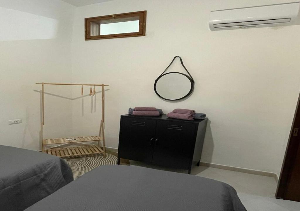 A bed or beds in a room at CASA VACANZE VIA CASALE