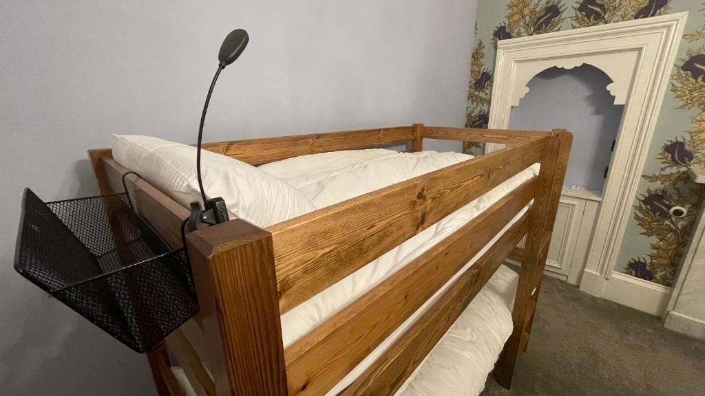 Postel nebo postele na pokoji v ubytování Moffat Independent Hostel