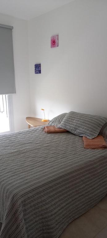 En eller flere senge i et værelse på Kenty Salta