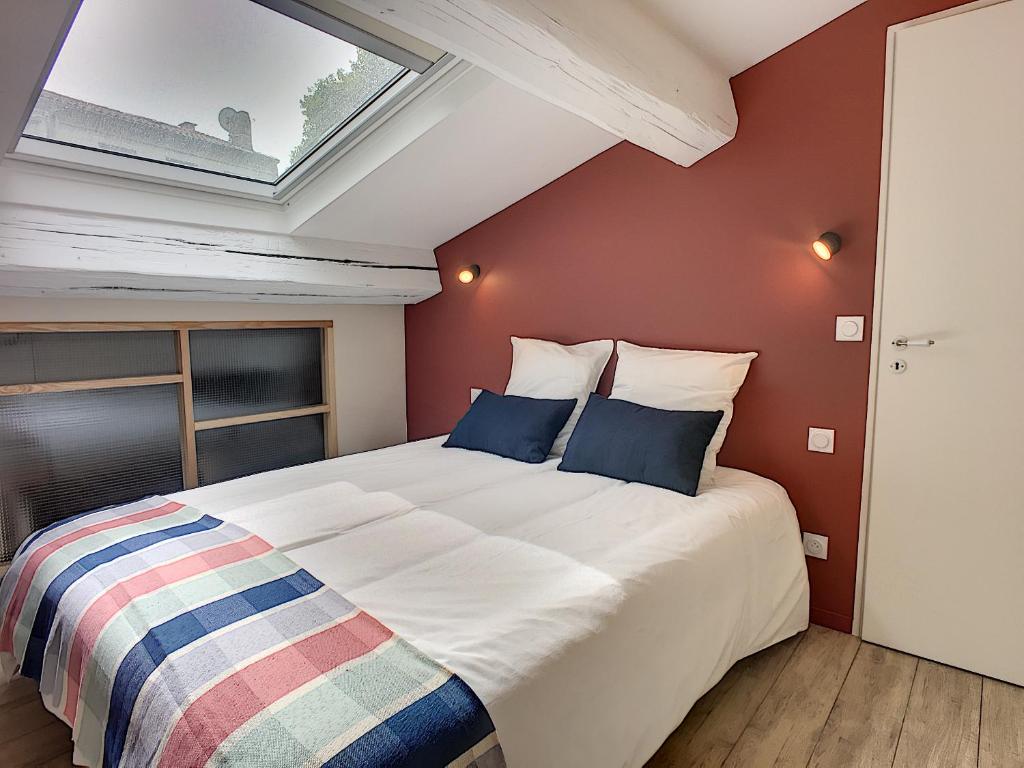 Postel nebo postele na pokoji v ubytování Maison Luxe 4 chambres - Patio - Climatisation - 10 minutes à pied du Pont d'Avignon