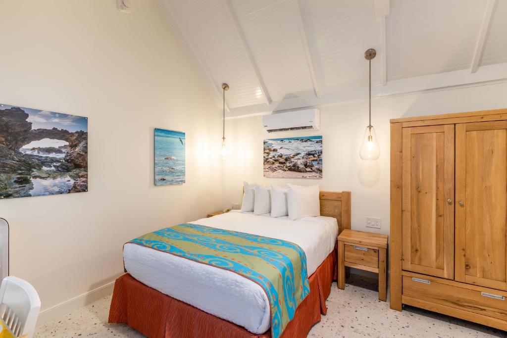 Postel nebo postele na pokoji v ubytování Amsterdam Manor Beach Resort