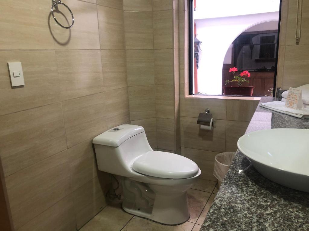 Koupelna v ubytování Hotel Ambassador