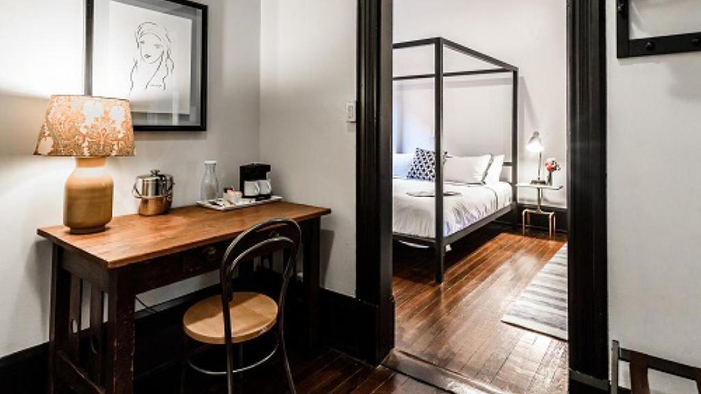 Postel nebo postele na pokoji v ubytování Hotel Giles