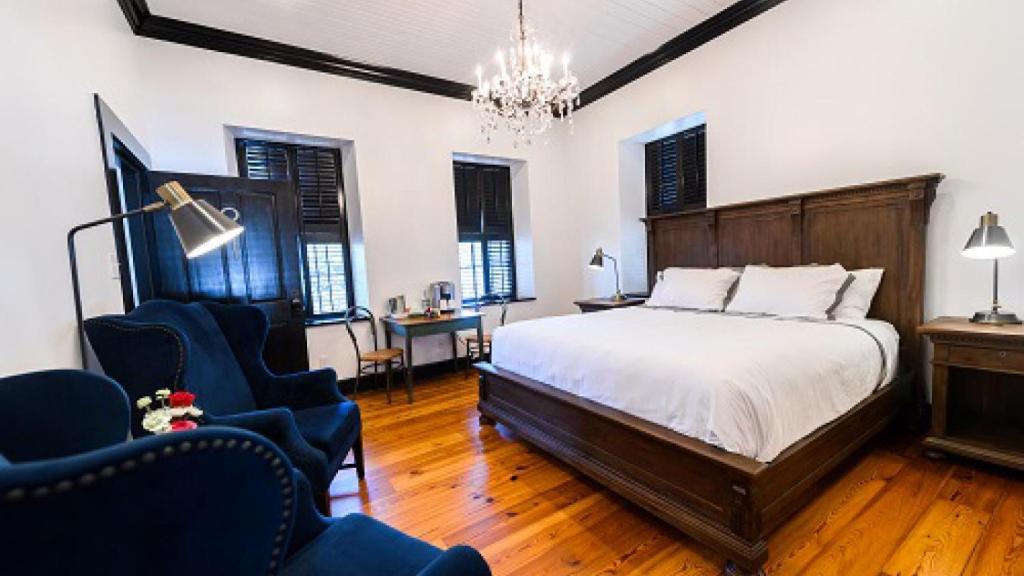 Postel nebo postele na pokoji v ubytování Hotel Giles