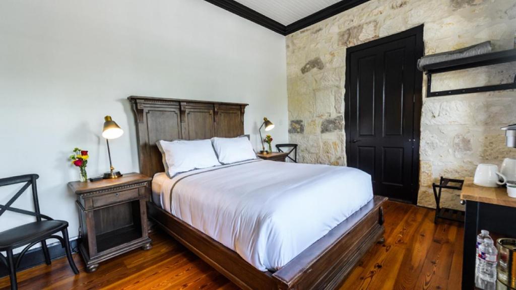 Postel nebo postele na pokoji v ubytování Hotel Giles