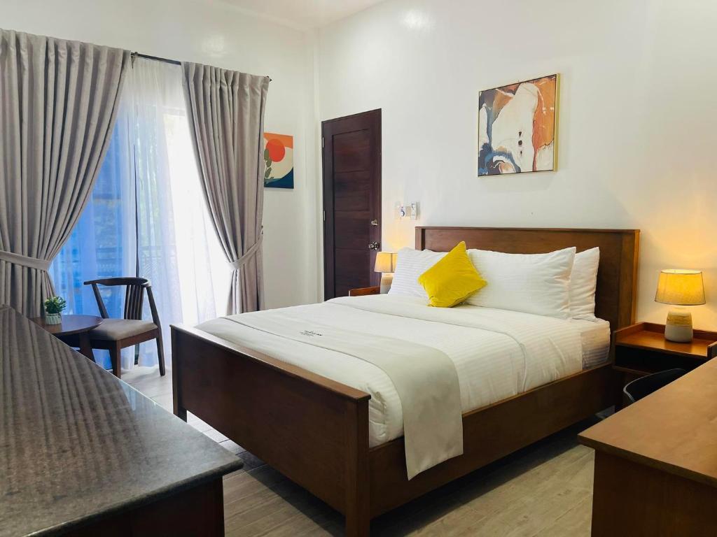 Postel nebo postele na pokoji v ubytování Thistle Inn