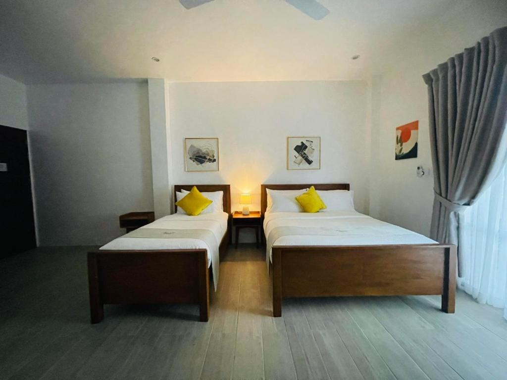 Postel nebo postele na pokoji v ubytování Thistle Inn