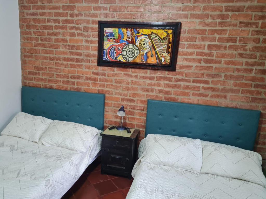 Cama o camas de una habitación en Hospederia Marques Casa Ramos