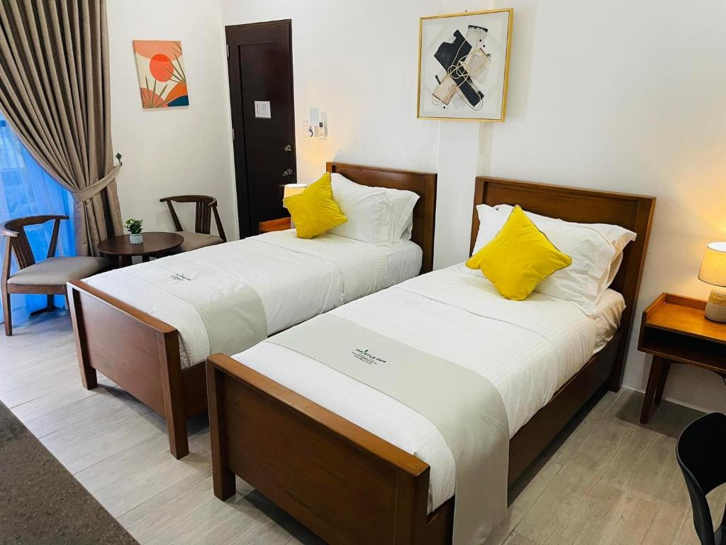 Postel nebo postele na pokoji v ubytování Thistle Inn