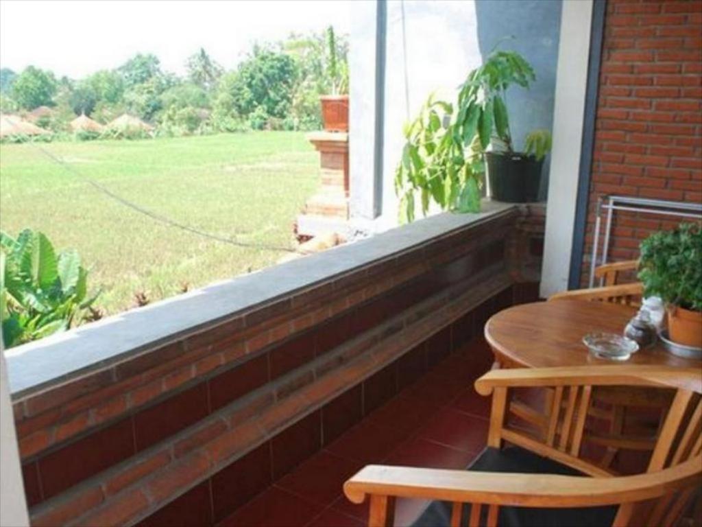 Balkón nebo terasa v ubytování Candra Asri Bungalow
