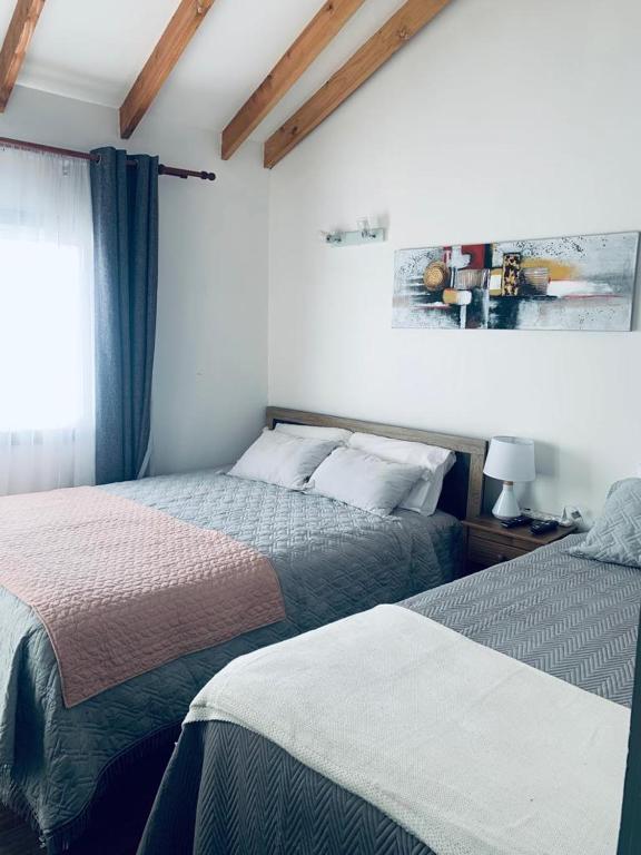 Letto o letti in una camera di Hostal Uruz