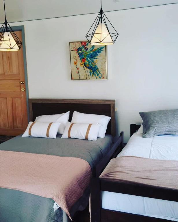 Letto o letti in una camera di Hostal Uruz