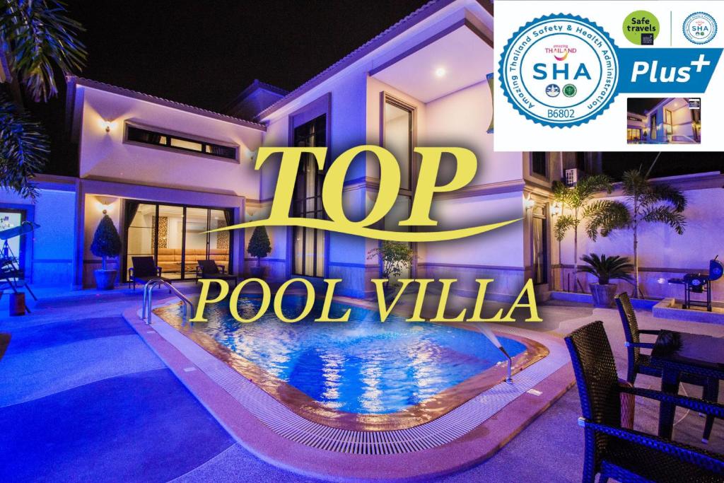 a house with a pool villa with the words top pool villa at Top Pool Villa B5 in Pattaya Central