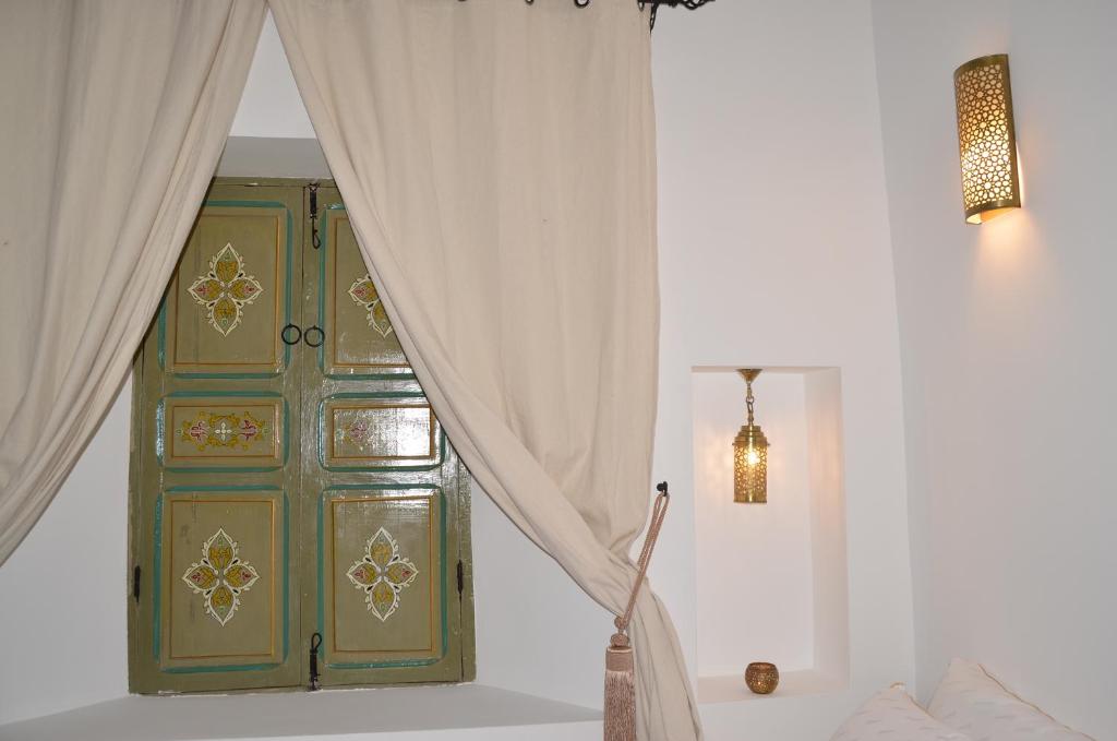 Postel nebo postele na pokoji v ubytování Riad Dar Hamid Hotel & Spa