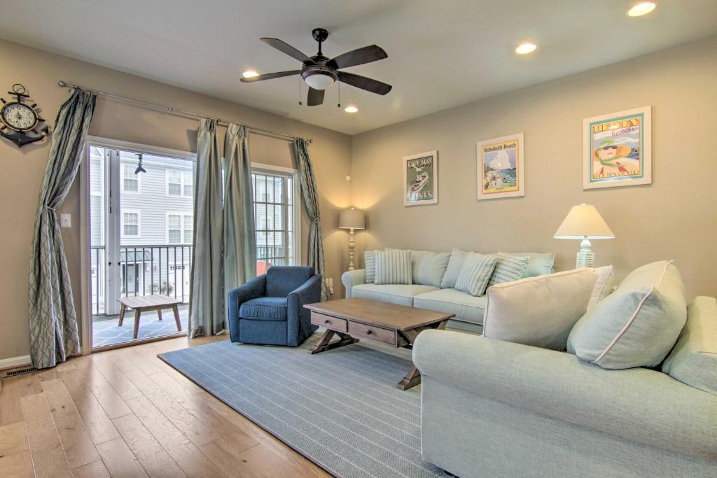 a living room with a couch and a table at Charming Rehoboth Retreat Less Than 3 Mi to Beach! in Rehoboth Beach