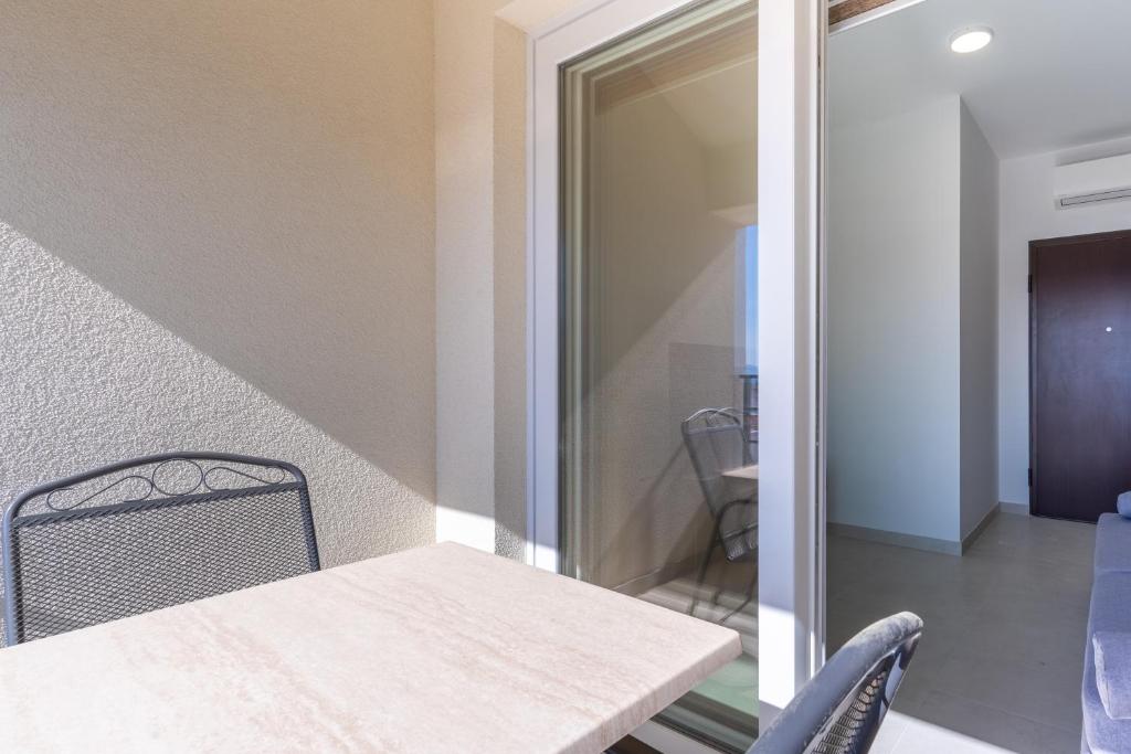 Posteľ alebo postele v izbe v ubytovaní Season Surprise Apartment