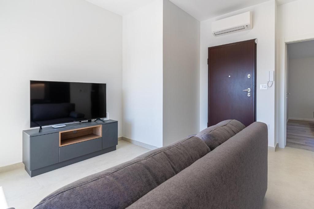 Televízia a/alebo spoločenská miestnosť v ubytovaní Season Surprise Apartment