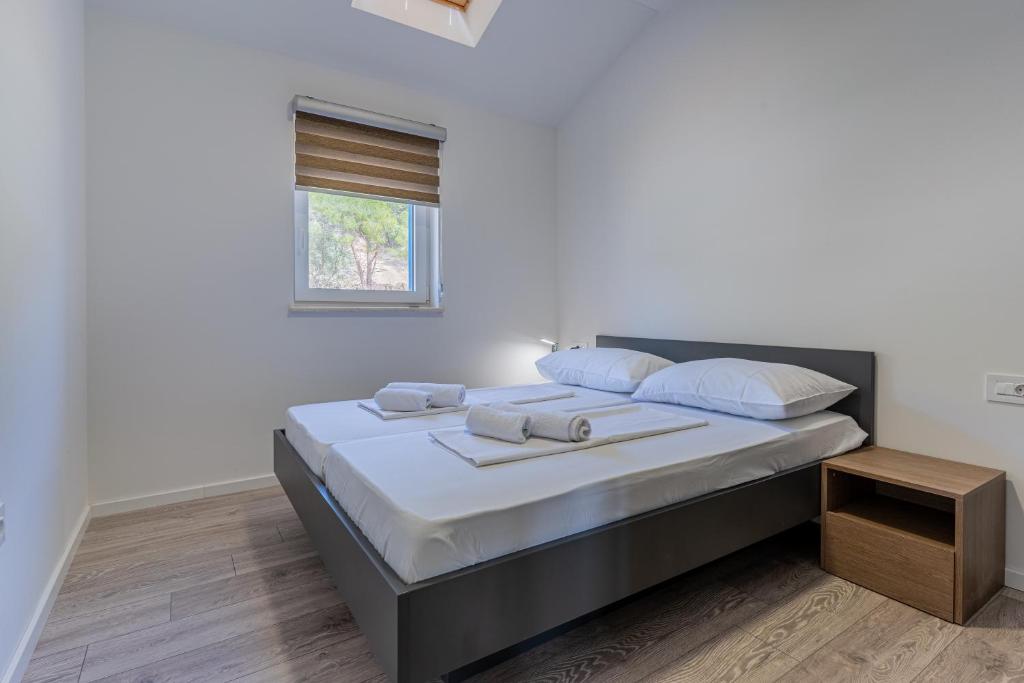 Posteľ alebo postele v izbe v ubytovaní Season Surprise Apartment