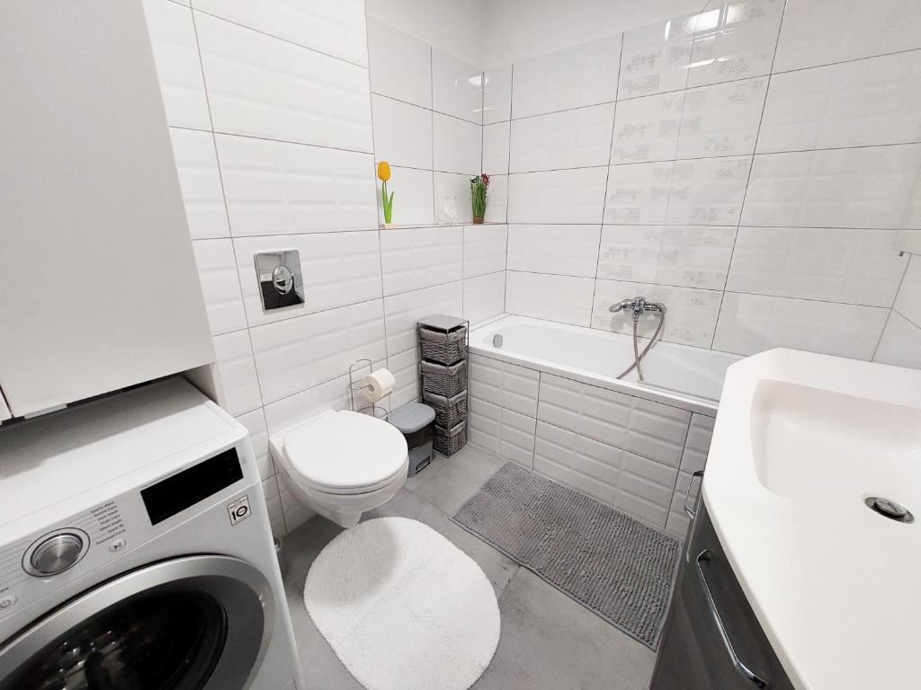 Kúpeľňa v ubytovaní Juhar Apartman