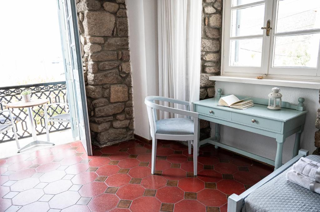 A balcony or terrace at Dionysos Hotel