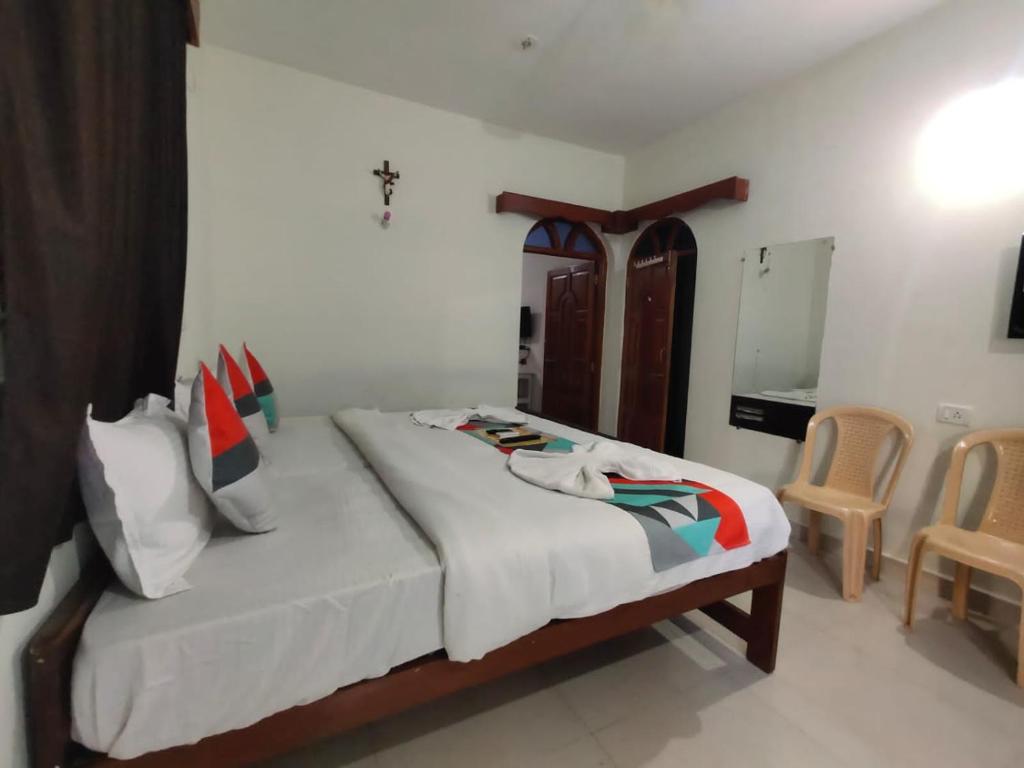 Postel nebo postele na pokoji v ubytování RJ14 Accommodations at Baga Beach