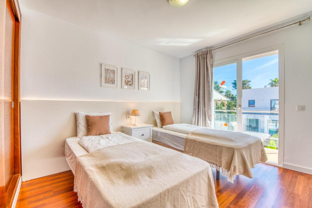 Posteľ alebo postele v izbe v ubytovaní Villa Playa Esperanza, Pool Heizung, 7 Gäste