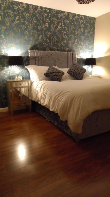 Кровать или кровати в номере Killarney Saoirse Apartment