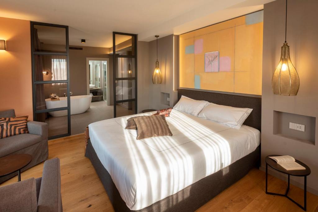 Postel nebo postele na pokoji v ubytování Agriturismo Speziale Wine Resort