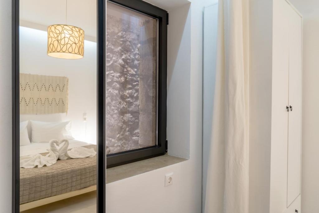 Postel nebo postele na pokoji v ubytování Quattro Domus townhouse 3