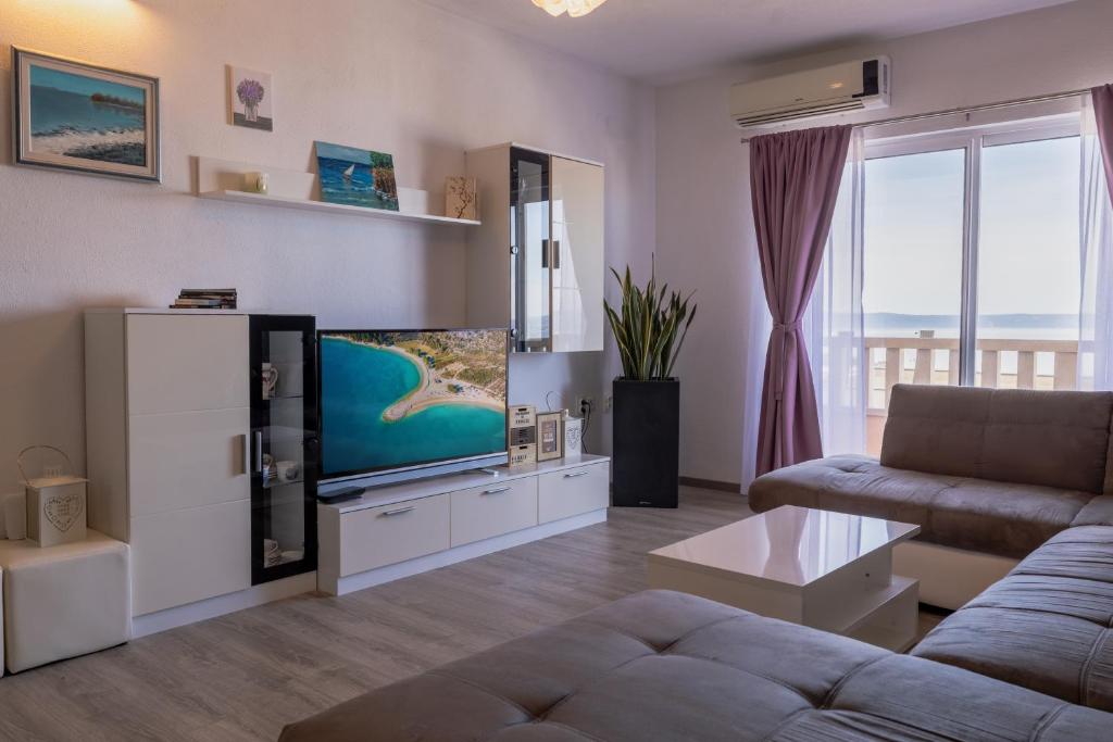 TV a/nebo společenská místnost v ubytování Apartment Dany - Free Beach Parking