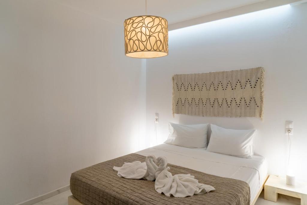 Postel nebo postele na pokoji v ubytování Quattro Domus townhouse 3