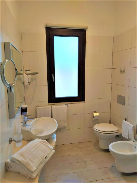 Koupelna v ubytování Hotel Belvir