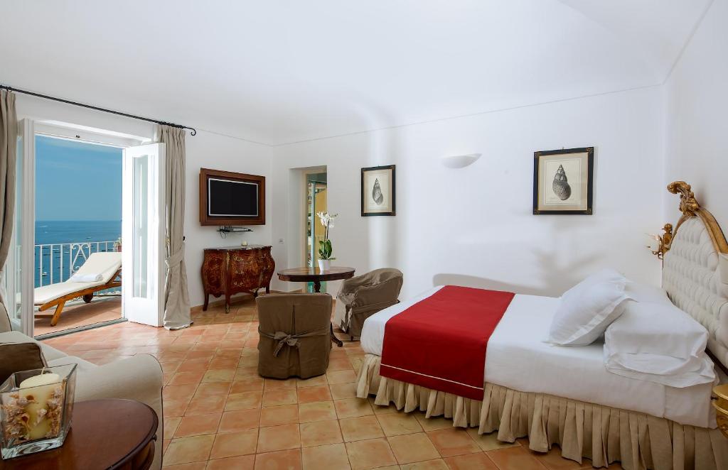 Postel nebo postele na pokoji v ubytování Hotel L'Ancora