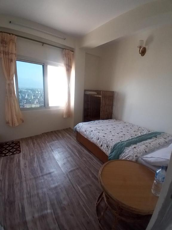 Postel nebo postele na pokoji v ubytování Green Mandala Inn