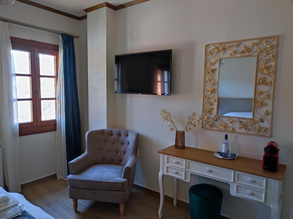 TV a/nebo společenská místnost v ubytování NUCA GUESTHOUSE
