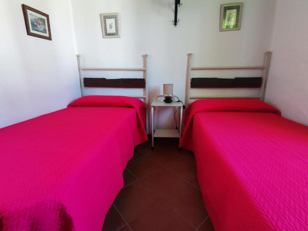 Postel nebo postele na pokoji v ubytování El Cortijo de Pepa