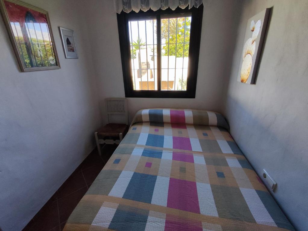Postel nebo postele na pokoji v ubytování El Cortijo de Pepa