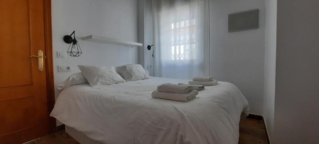 Postel nebo postele na pokoji v ubytování APARTAMENTO EN BARBATE