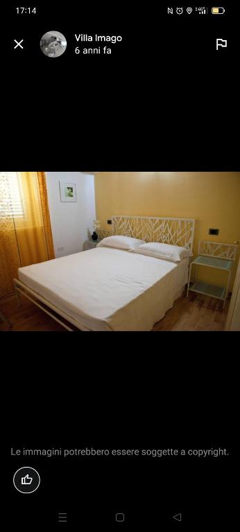 Postel nebo postele na pokoji v ubytování Villa Imago