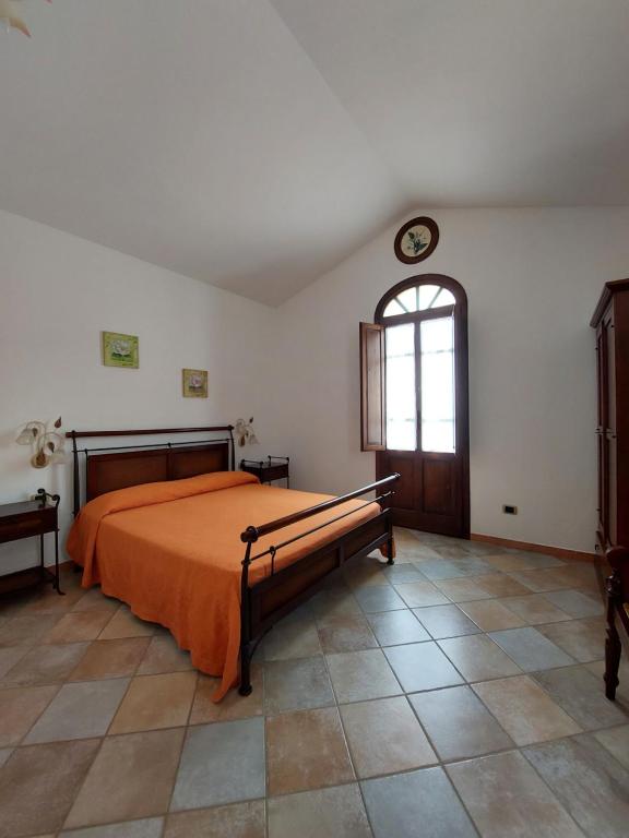 Łóżko lub łóżka w pokoju w obiekcie Hotel La Corte Rosada