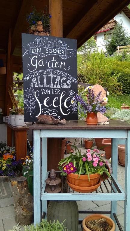 Vonkajšia záhrada v ubytovaní Haus Flora am Kaiser