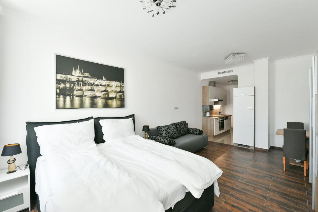 Postel nebo postele na pokoji v ubytování Apartmány Na Náměstí 85