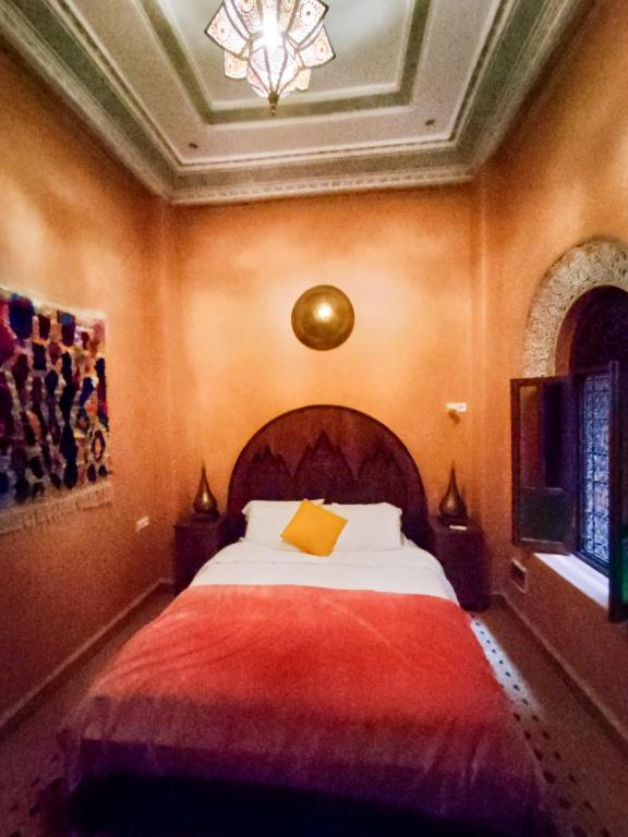 Postel nebo postele na pokoji v ubytování Riad le petit ksar