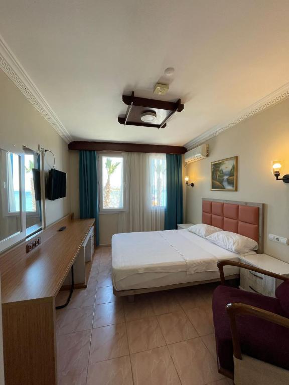 Postel nebo postele na pokoji v ubytování Arden Hotel
